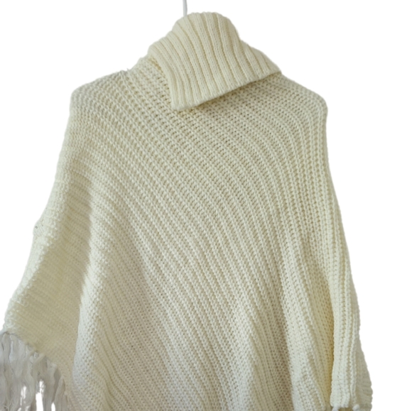 EUC! Ivory Knit Poncho with Silver sequin detail. Fits up to Size L. - Picture 2 of 5